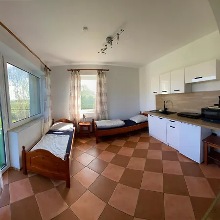 ゲストハウス Sloneczny Brzeg 3*