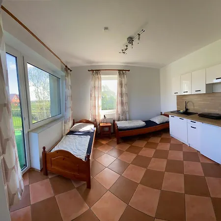 ゲストハウス Sloneczny Brzeg 3*